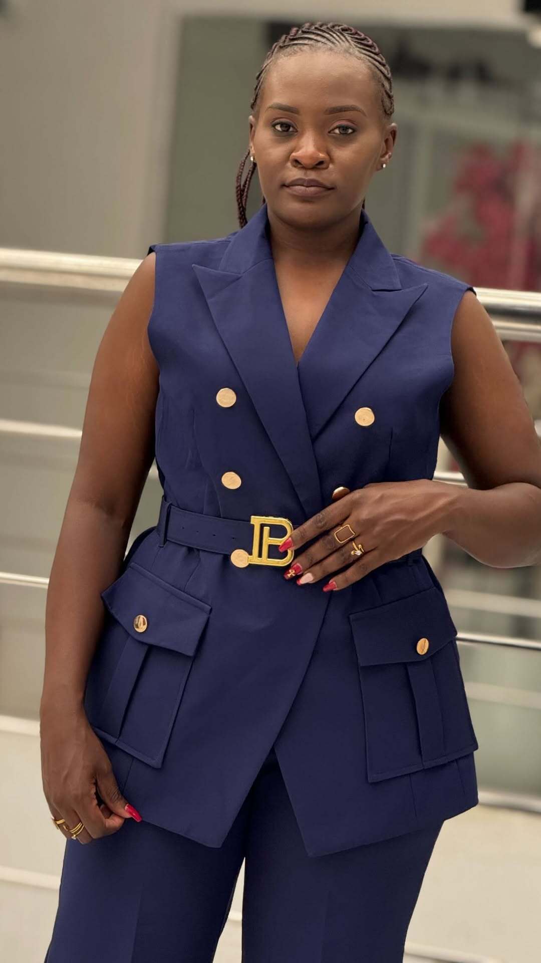 Fashion model in a navy tailored outfit